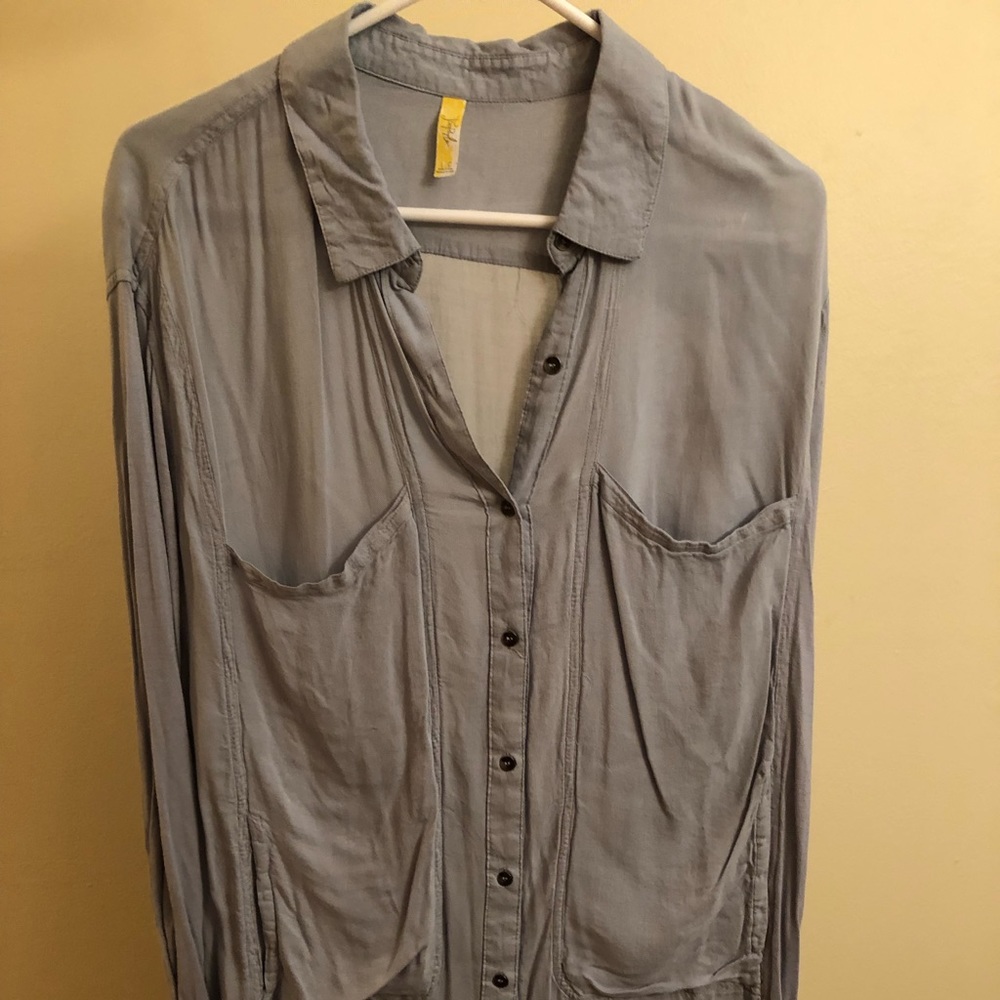 Pale blue button down long shirt with long sleeves